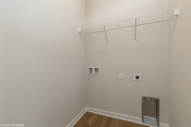 washroom featuring hookup for an electric dryer, washer hookup, and dark hardwood / wood-style flooring