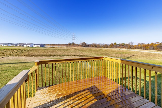 wooden deck with a yard