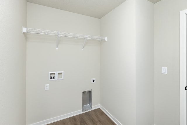 laundry room with hookup for an electric dryer, hookup for a washing machine, a textured ceiling, and dark hardwood / wood-style flooring