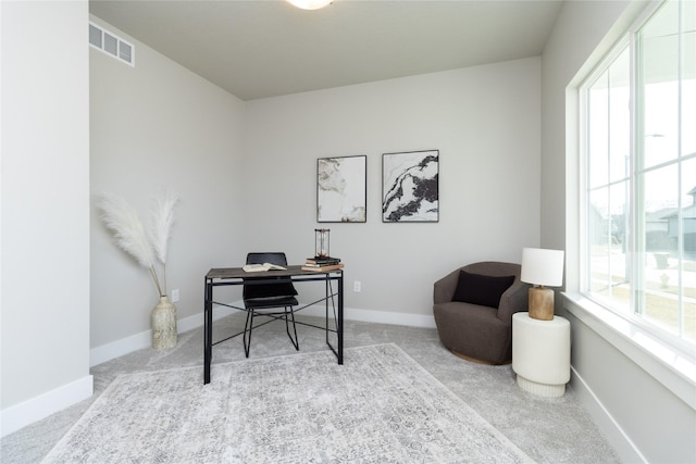 office area with light colored carpet