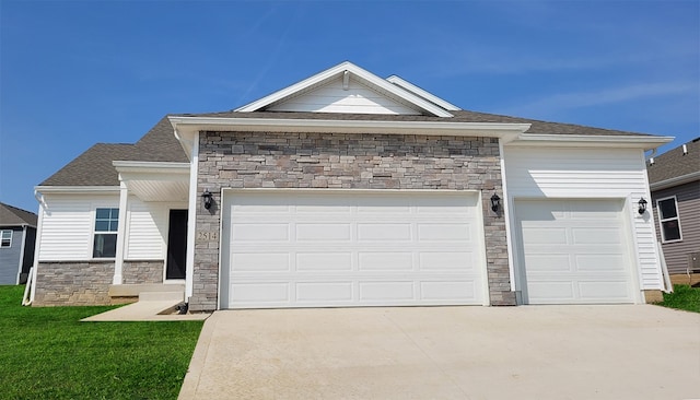 ranch-style house with a garage and a front yard