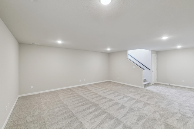 basement with light carpet