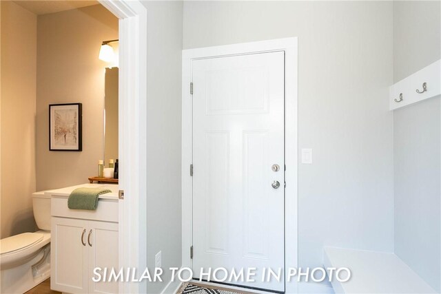 bathroom with vanity and toilet