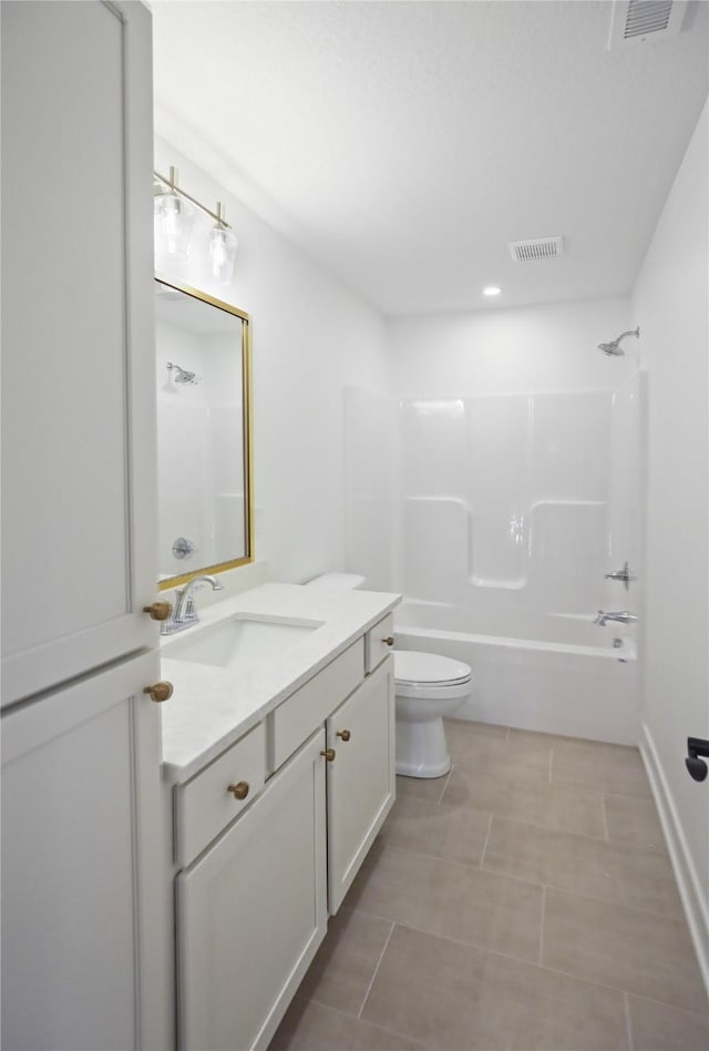 1773 Highland Cir SW, Altoona, IA 50009 - bathroom featuring toilet, vanity, bathing tub / shower combination, and tile patterned floors