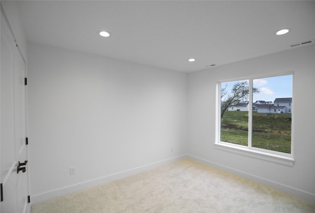 1773 Highland Cir SW, Altoona, IA 50009 - carpeted empty room with recessed lighting and baseboards