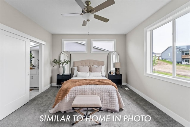 carpeted bedroom featuring ensuite bathroom and ceiling fan