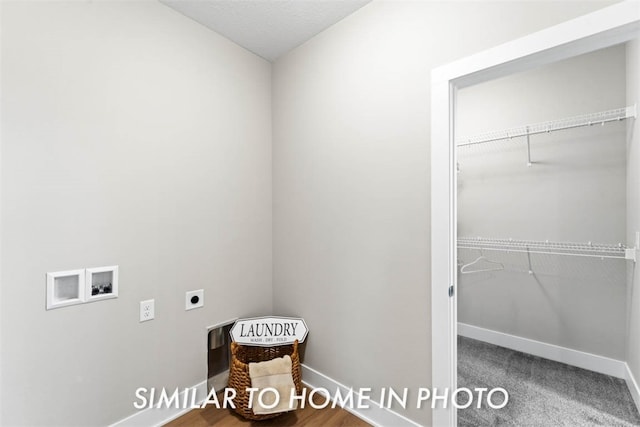 washroom featuring washer hookup, electric dryer hookup, and carpet