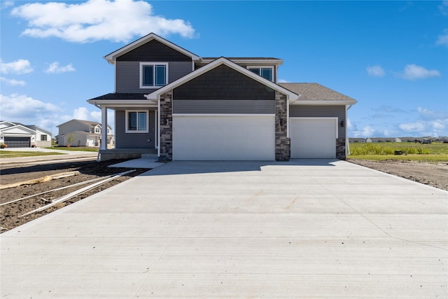 view of front of property with a garage