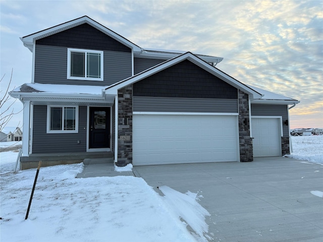 view of front of property with a garage