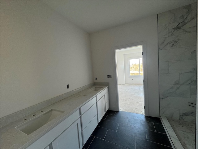 bathroom featuring tile patterned floors and vanity