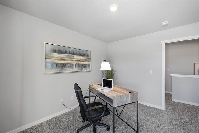 home office with carpet flooring and baseboards