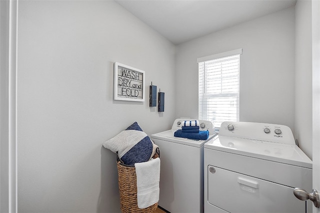 washroom featuring separate washer and dryer