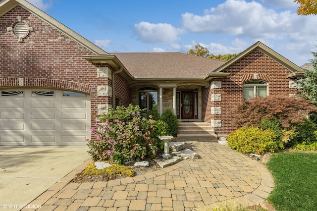 view of front of property with a garage