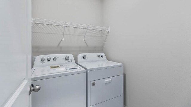 laundry area featuring separate washer and dryer