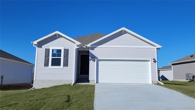 ranch-style house with a front yard, a garage, and central AC unit