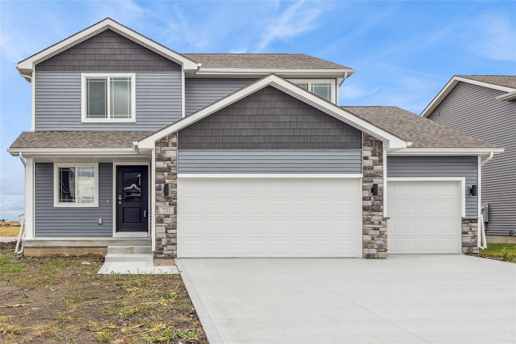 craftsman inspired home featuring a garage