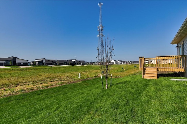 view of yard with a wooden deck