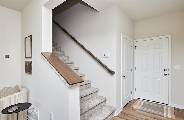 interior space with hardwood / wood-style flooring