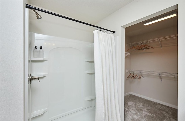 bathroom featuring shower / tub combo with curtain