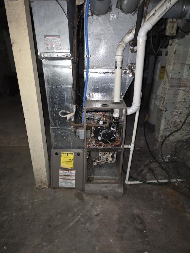313 N Walnut St, Creston, IA 50801 - utility room featuring heating utilities