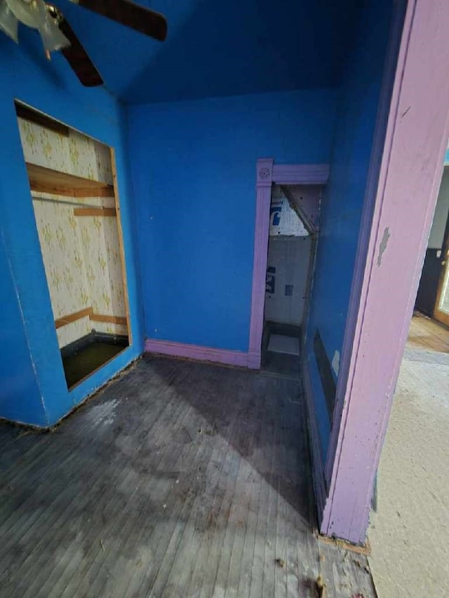313 N Walnut St, Creston, IA 50801 - unfurnished bedroom featuring dark hardwood / wood-style floors