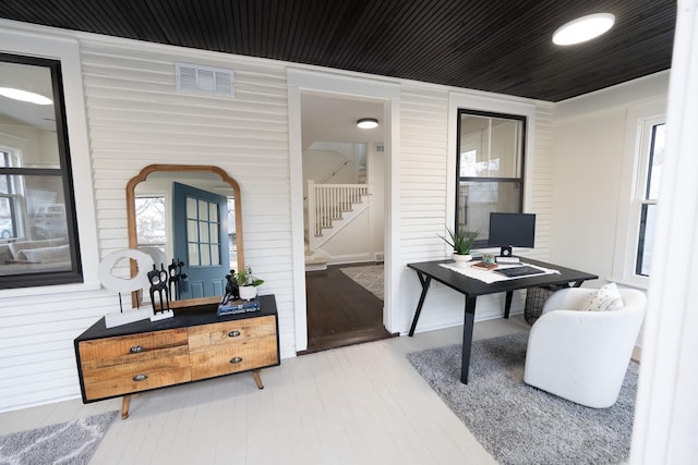 home office featuring hardwood / wood-style flooring