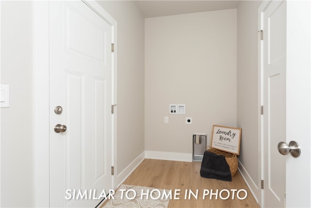 laundry area featuring hookup for a washing machine, hookup for an electric dryer, laundry area, baseboards, and light wood-type flooring