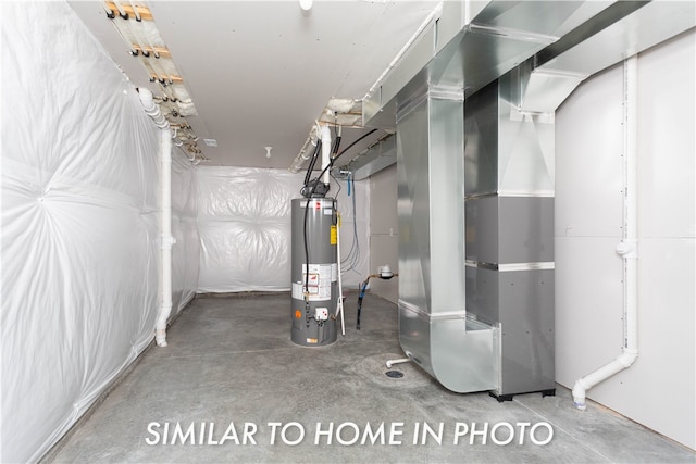 utility room with gas water heater