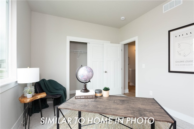 office area with baseboards and visible vents