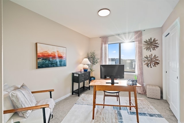 home office featuring light colored carpet