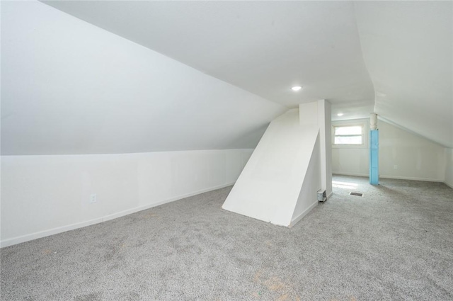 1613 York St, Des Moines, IA 50316 - bonus room with lofted ceiling and light colored carpet