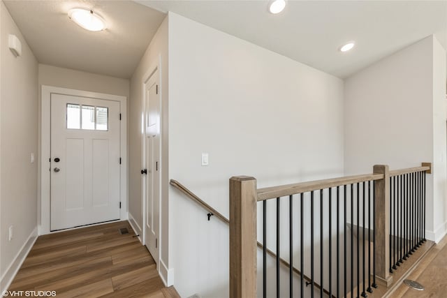 entryway featuring dark wood-type flooring