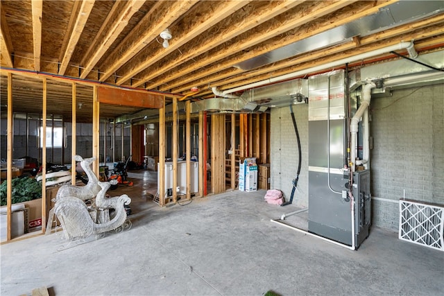 basement featuring heating utilities