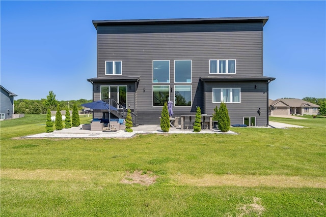 back of property featuring a patio and a lawn