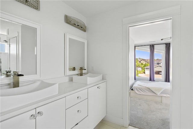 bathroom featuring vanity with extensive cabinet space