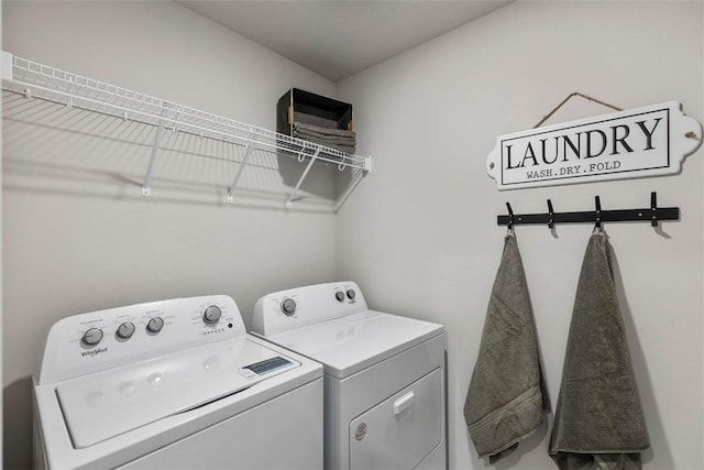 laundry area featuring laundry area and washer and dryer