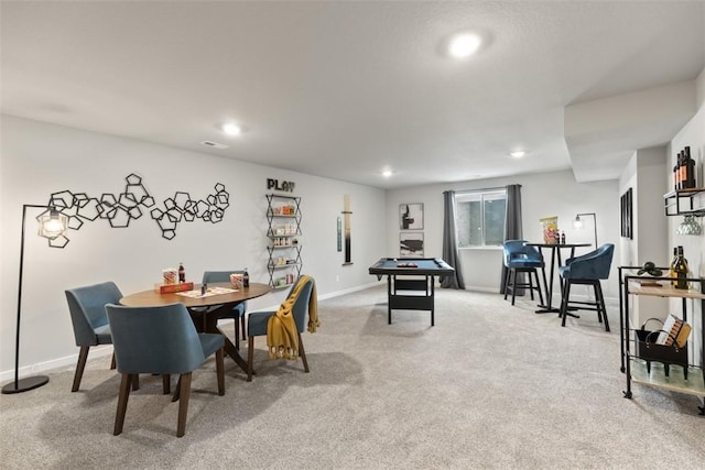 dining area with light carpet