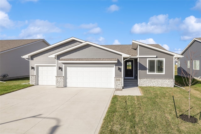 ranch-style home with a front yard and a garage