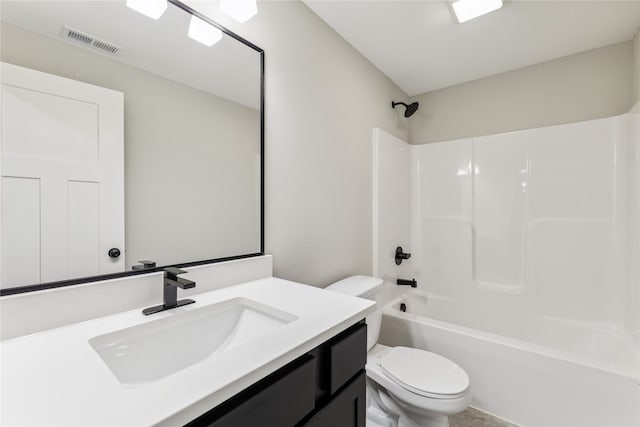 full bathroom featuring vanity, bathing tub / shower combination, and toilet