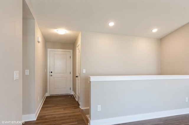 hallway featuring dark hardwood / wood-style floors