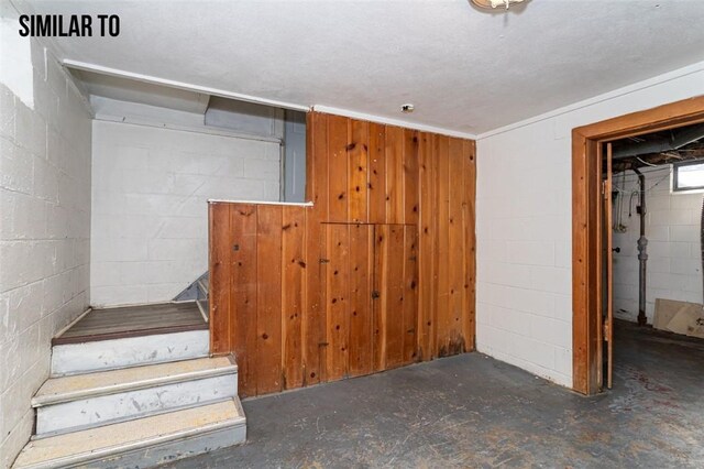 basement with a textured ceiling