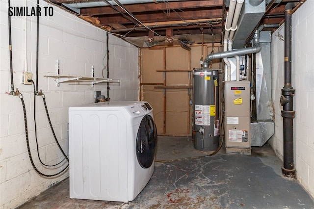 interior space with water heater and washer / clothes dryer