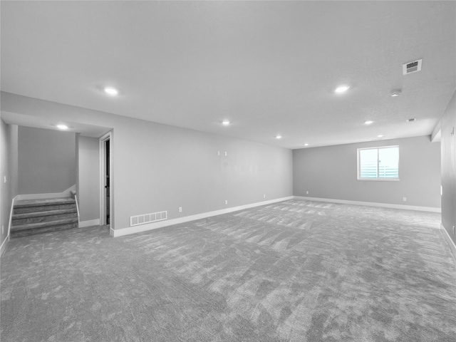 basement featuring carpet flooring