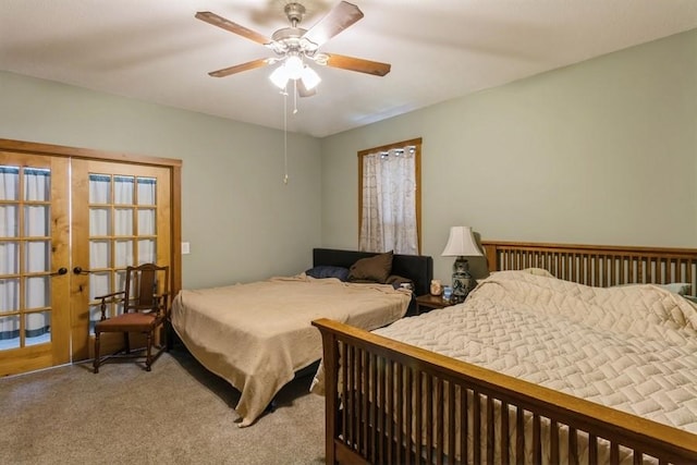 bedroom with french doors, a ceiling fan, and carpet flooring