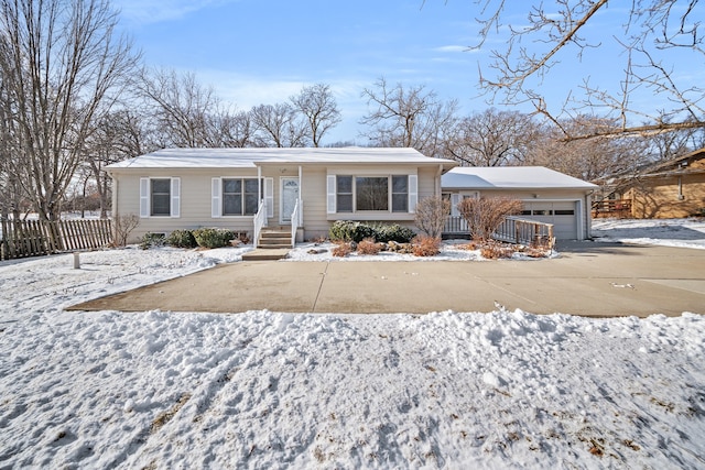 ranch-style home with a garage