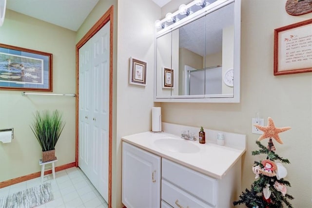 bathroom featuring vanity and walk in shower