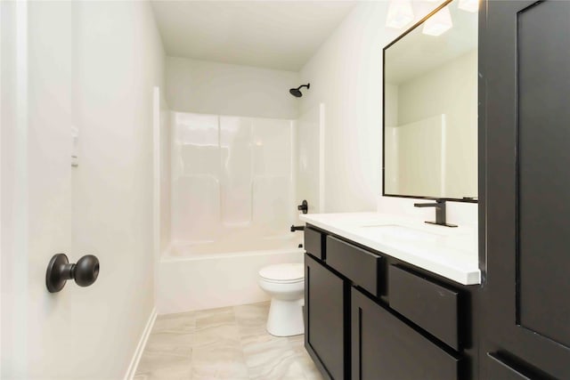 bathroom with vanity, shower / tub combination, and toilet