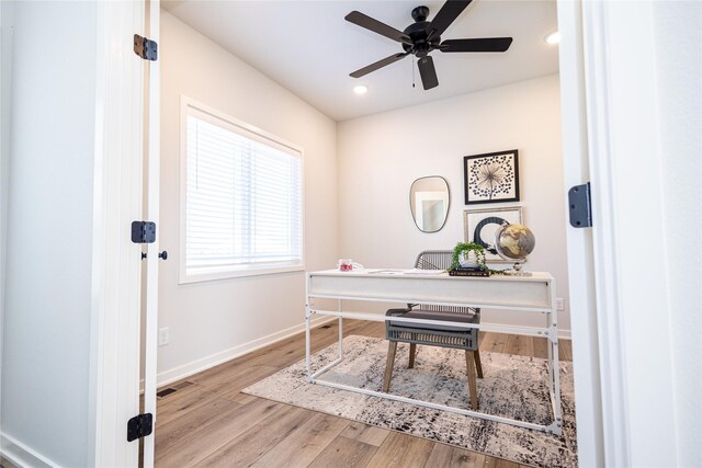 home office featuring a ceiling fan, wood finished floors, visible vents, baseboards, and recessed lighting