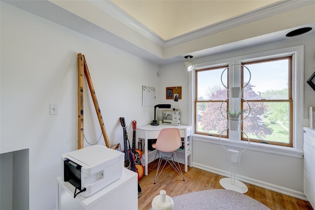 office area featuring light hardwood / wood-style flooring and ornamental molding