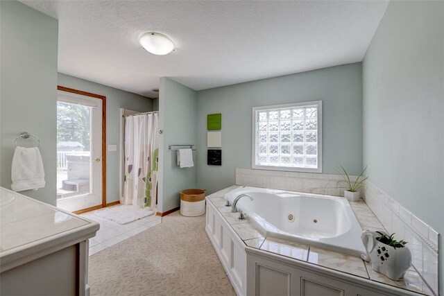 bathroom with shower with separate bathtub, a textured ceiling, and tile patterned floors